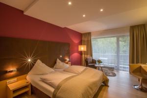 Postel nebo postele na pokoji v ubytování Hotel Krainerhütte