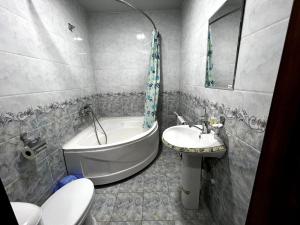 Phòng tắm tại XIVA AZIM OTA