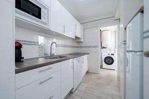 Kuchyň nebo kuchyňský kout v ubytování Hauzify I Apartament Punta del Cavall
