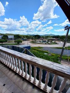 a balcony with a view of a parking lot at Pousada Adorno in Colinas Do Sul