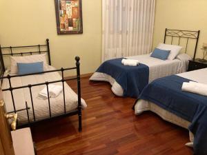 Postelja oz. postelje v sobi nastanitve Casa El Descanso Ortigosa del Monte