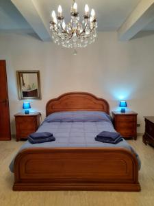 Ένα ή περισσότερα κρεβάτια σε δωμάτιο στο La Casa di Lina