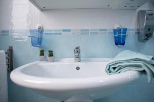 Ένα μπάνιο στο Il vicolo suite rooms