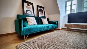 TV a/nebo společenská místnost v ubytování One Apartment's⎢Neu+Zentral⎢Alberstplatz⎢Altbau