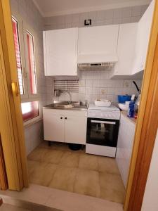 Kuchyňa alebo kuchynka v ubytovaní la casa di enzo