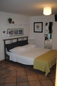 Postel nebo postele na pokoji v ubytování B&B Al Castagneto