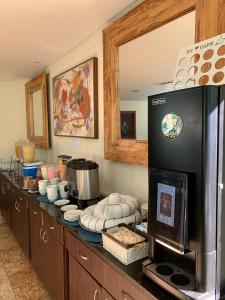 Dapur atau dapur kecil di Marulhos Suites