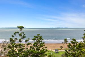 a beach with a view of the ocean at Bayview Tower in Yeppoon