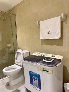 Koupelna v ubytování Al Rawdha Hotel Apartments