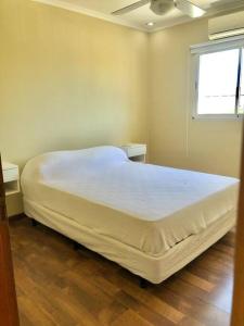 Ein Bett oder Betten in einem Zimmer der Unterkunft Departamento entero con cochera