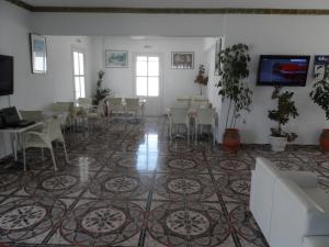 TV a/nebo společenská místnost v ubytování Athena Pallas