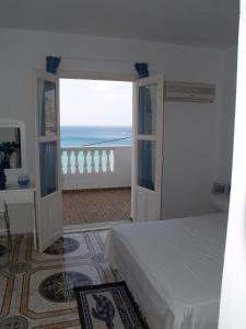 Postel nebo postele na pokoji v ubytování Athena Pallas