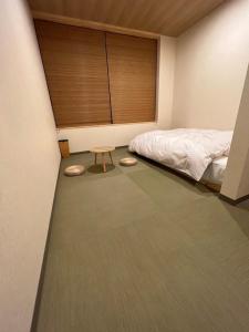 Letto o letti in una camera di 城崎温泉 小宿 紬 tsumugi