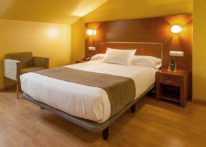 Postel nebo postele na pokoji v ubytování Hotel Andia