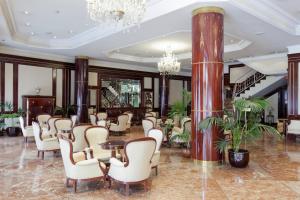O saguão ou recepção de Hotel Alameda Palace
