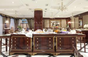 Um restaurante ou outro lugar para comer em Hotel Alameda Palace