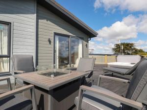 Rõdu või terrass majutusasutuses Acorn Lodge