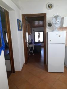 Kuchyňa alebo kuchynka v ubytovaní Appartamento “Il Borgo” + 33 fotografií