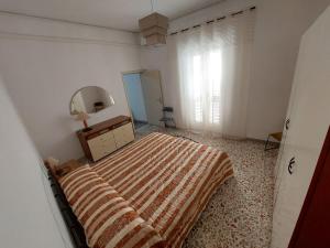 Posteľ alebo postele v izbe v ubytovaní Casa Gilè