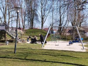 Mynd úr myndasafni af Schaake Hooksiel - Charmante Reetdachwohnung & Kostenfreier Parkplatz í Hooksiel