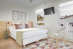 Posteľ alebo postele v izbe v ubytovaní Villa Loretopea by FeelFree Rentals