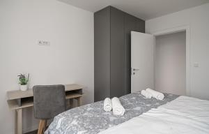 Postel nebo postele na pokoji v ubytování Apartment SABBIA