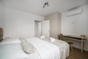 Postel nebo postele na pokoji v ubytování Apartment SABBIA