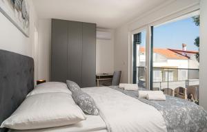 Postel nebo postele na pokoji v ubytování Apartment SABBIA