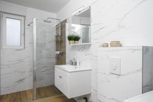 Koupelna v ubytování Apartment SABBIA