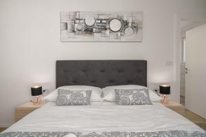 Postel nebo postele na pokoji v ubytování Apartment SABBIA