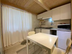 Kuchyň nebo kuchyňský kout v ubytování White albergo diffuso Ristorante & SPA
