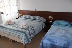Ένα ή περισσότερα κρεβάτια σε δωμάτιο στο B&B IlGirasole