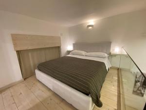 Postel nebo postele na pokoji v ubytování White albergo diffuso Ristorante & SPA
