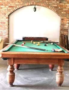 a pool table with balls on top of it at Polonez w Rymaniu in Rymań