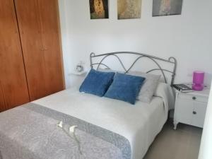 Postel nebo postele na pokoji v ubytování Residencial La Cala + 13 fotografií