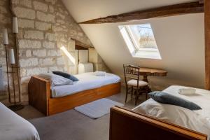 Ένα ή περισσότερα κρεβάτια σε δωμάτιο στο Maison Camilia