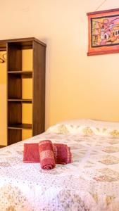 Postel nebo postele na pokoji v ubytování Residencial Los Pinos