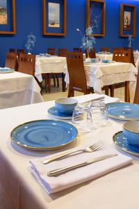 A restaurant or other place to eat at Bed and Breakfast El Pekinaire