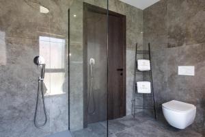 Koupelna v ubytování Luxury villa GRANDIOSA with sauna and jacuzzi