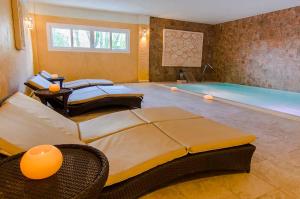 Cama ou camas em um quarto em El Cortijo de Zahara by QHotels