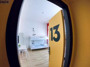 A bed or beds in a room at QUO Milano
