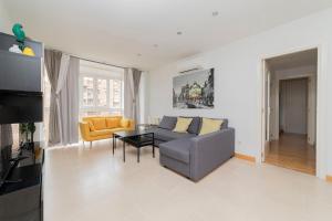 Posezení v ubytování APARTAMENTO MADRID rio 4ºA