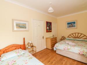 Voodi või voodid majutusasutuse Ballysheen House toas