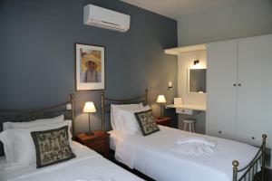 Llit o llits en una habitació de Castello del Mare