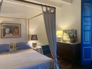 Posteľ alebo postele v izbe v ubytovaní A casa di Rebecca