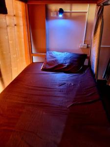 Ein Bett oder Betten in einem Zimmer der Unterkunft T2B Hostel