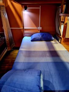 Ein Bett oder Betten in einem Zimmer der Unterkunft T2B Hostel