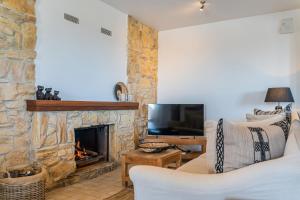TV a/nebo společenská místnost v ubytování Luxury Villa with panoramic views over Moraira
