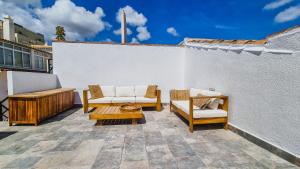 A seating area at Eco Playa Suites - Beach & Golf!