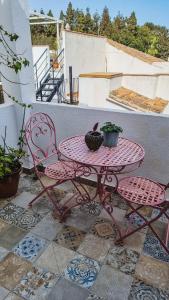 A balcony or terrace at Eco Playa Suites - Beach & Golf!